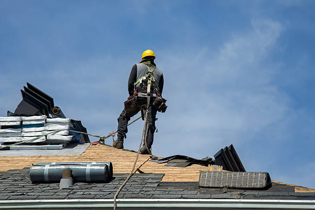 Professional Gutter Installation technician working in North Palm Beach, FL